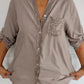 Melina™ | Casual top met knopen en pailletten